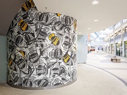 Haagse Hopjes behang voor de Megastores