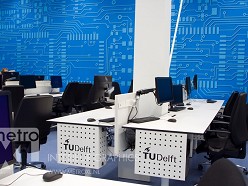 TU Delft Fotobehang op muur